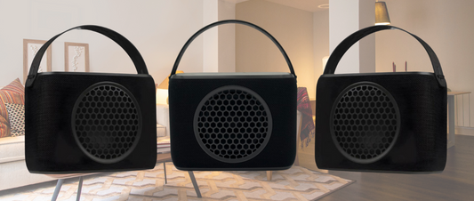 3 Rocksteady Stadium Subwoofers with background of a living room